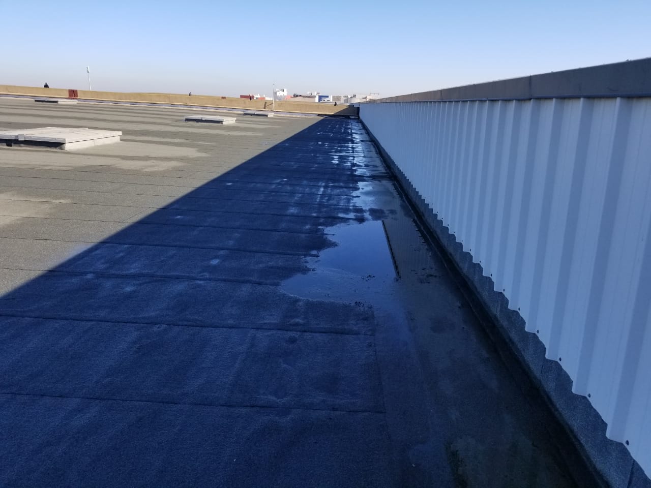 flat roof ballasted solar racking project - mounting site